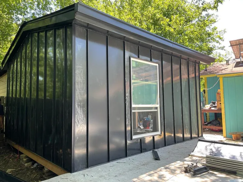 Black standing seam metal wall panels for Roof Inspection in Village of Oak Creek (Big Park)