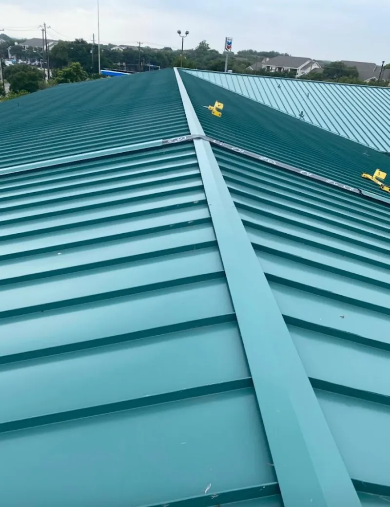 Green commercial metal roof ridge and valley for Metal Roof Repair in Village of Oak Creek (Big Park)